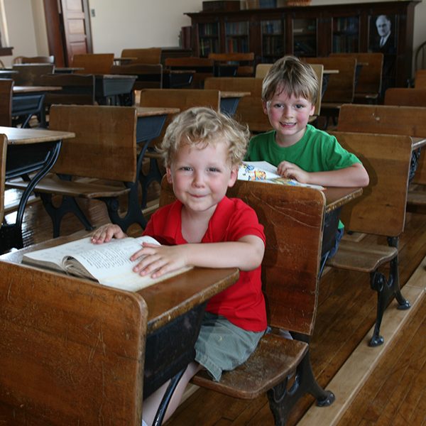 Kids reading books in a Reed School classroom